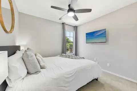 Guest bedroom -Our coziest bedroom with a Queen size bed, 43" Roku smart tv (on wall to the right of this pic, out of frame) is a large closet with plenty…