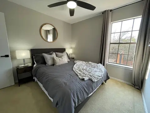 Guest bedroom -Our coziest bedroom with a Queen size bed, 43" Roku smart tv, on wall to the right of this pic out of frame is a large closet with plenty of…