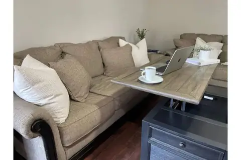 Fun feature-The downstairs coffee table actually lifts up for a cool convenient additional workspace!