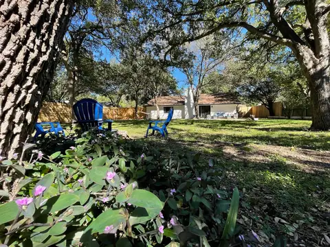 Gorgeous, natural 1/3 acre FULLY fenced for little ones or pets, a huge tree covered very private backyard! Grill, setup the hammock & enjoy the firepit &…