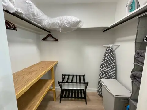 HUGE closet for extended stays! Hangers, Luggage Rack, iron & ironing board plus extra linens & hamper!