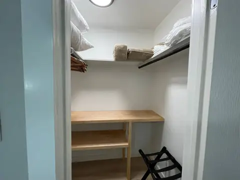 Huge closet! Luggage rack, extra pillows & linens, ample shelf space and hangers for your belongings on extended stays!