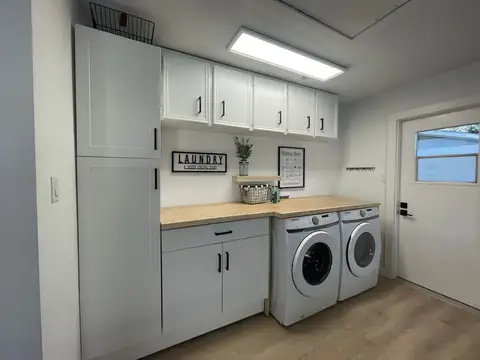 New Samsung front loading Washer & Dryer-Detergent, softener, scent booster as well a fantastic folding area w/extra lighting above! Insulated garage for…