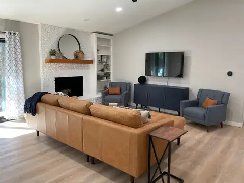 Plenty of room to relax. Side table here is perfect to move around for a laptop if you have some work to do.